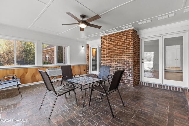 sunroom / solarium with ceiling fan