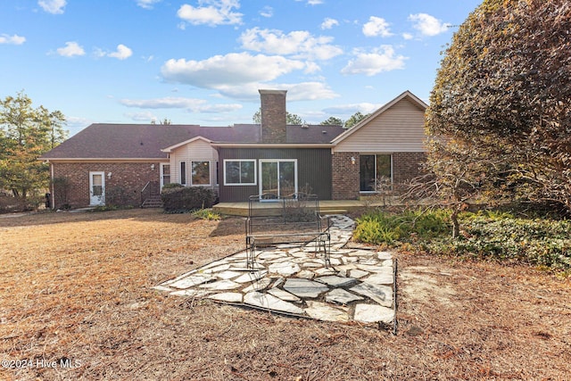 back of house featuring a patio area