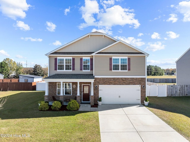 view of front of property with a garage and a front yard