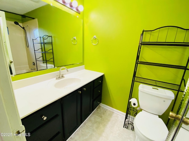 full bathroom featuring tub / shower combination, toilet, and vanity