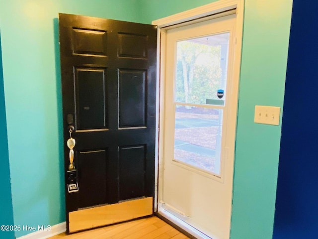 doorway featuring light wood-type flooring