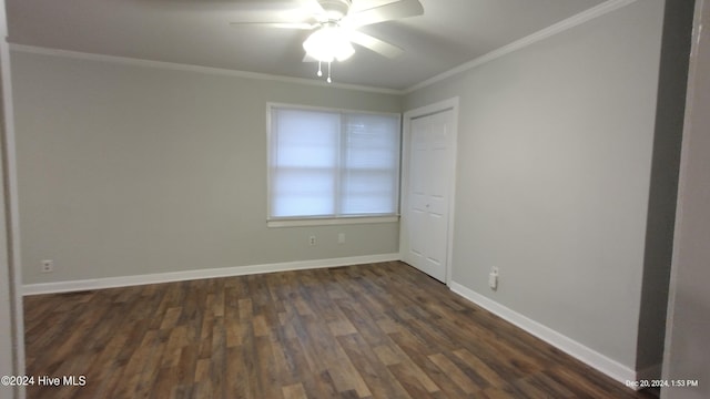 unfurnished room with crown molding, dark hardwood / wood-style flooring, and ceiling fan