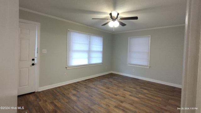 spare room with ceiling fan, dark hardwood / wood-style floors, and ornamental molding