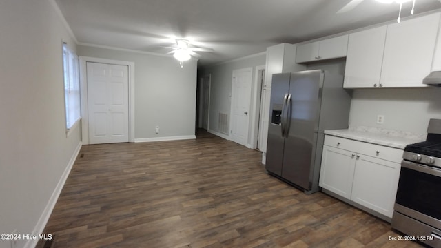 kitchen with white cabinets, appliances with stainless steel finishes, dark hardwood / wood-style floors, and ornamental molding