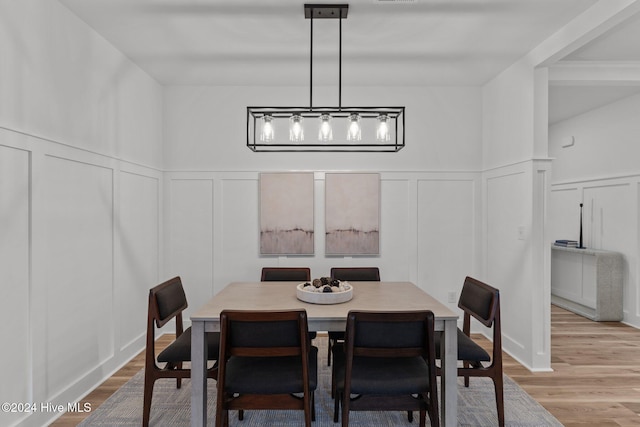 dining space featuring light hardwood / wood-style flooring