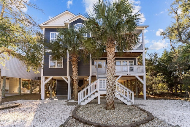 coastal home with a carport and covered porch