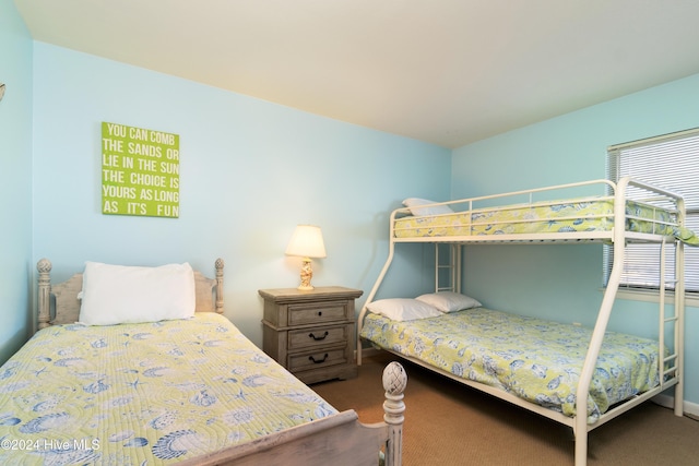 bedroom featuring carpet