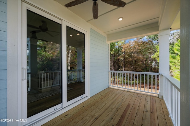 wooden deck with ceiling fan