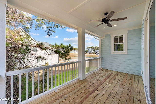 wooden deck with ceiling fan