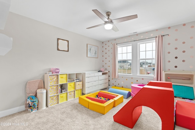 game room with ceiling fan and carpet floors