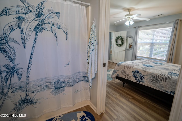 bedroom featuring ceiling fan and hardwood / wood-style flooring