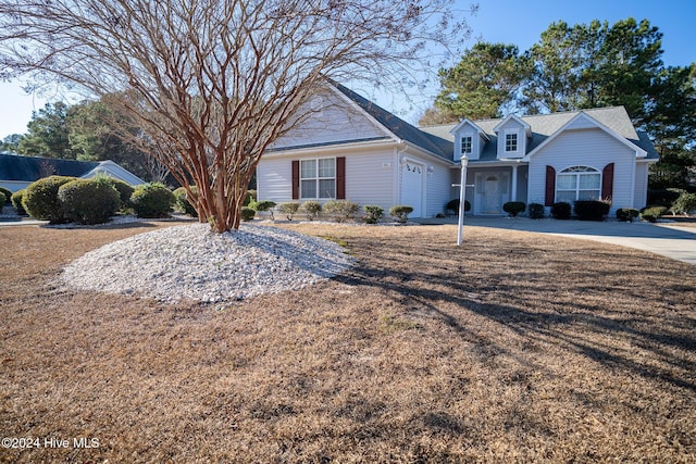 single story home featuring a garage