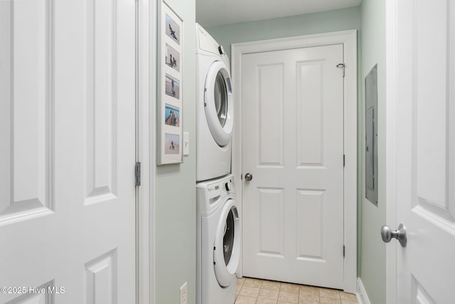 laundry room featuring laundry area and stacked washer and dryer