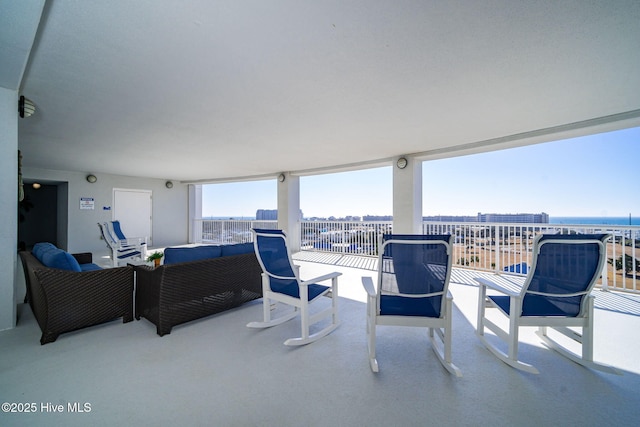 view of patio / terrace featuring an outdoor hangout area and a balcony