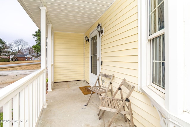 view of patio featuring a porch