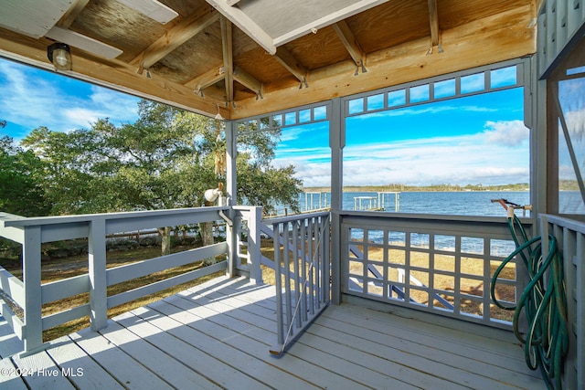 deck featuring a water view