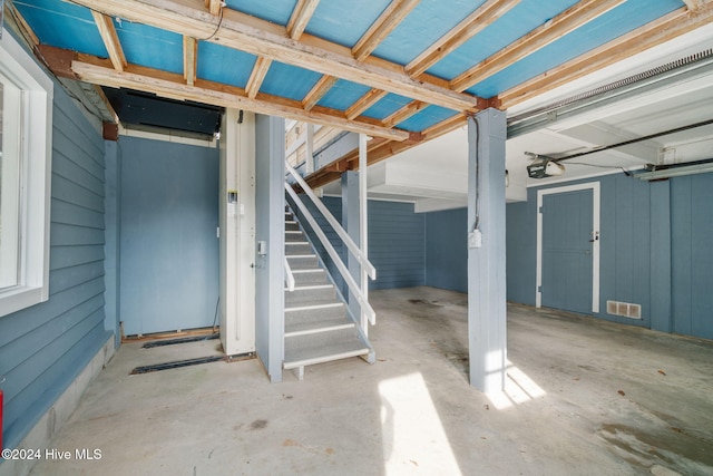 view of patio with stairs and visible vents