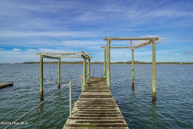 view of dock with a water view