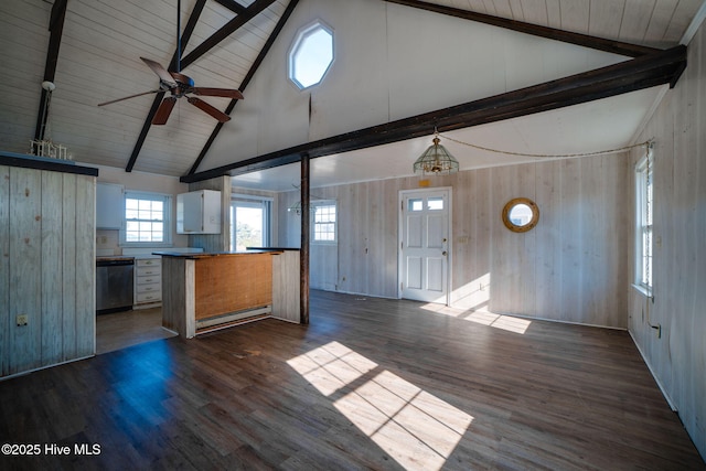 kitchen with white cabinetry, dark wood-type flooring, dishwasher, hanging light fixtures, and beamed ceiling