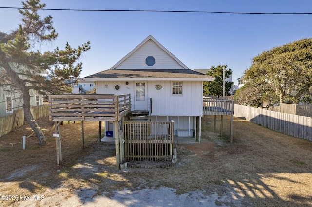 view of front of house with a wooden deck