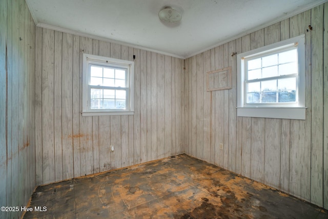 unfurnished room featuring ornamental molding