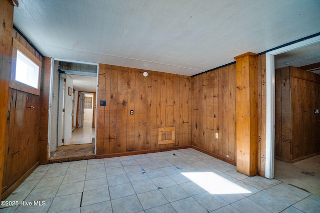 empty room with wooden walls