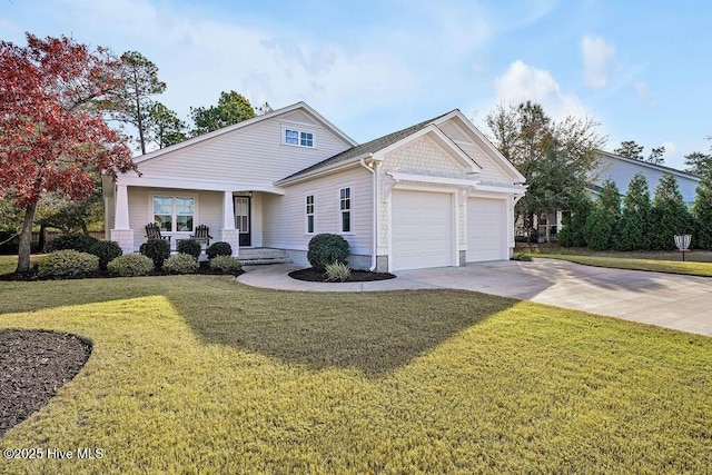 view of front facade with covered porch, a garage, and a front lawn