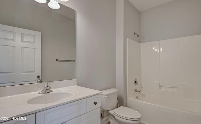 full bathroom with vanity, tub / shower combination, and toilet