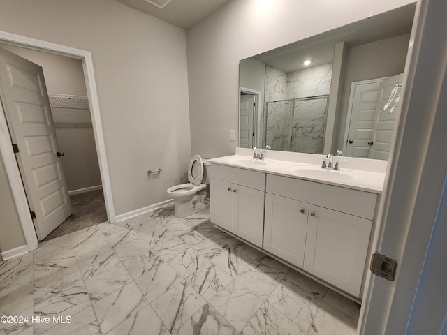 bathroom with vanity and an enclosed shower