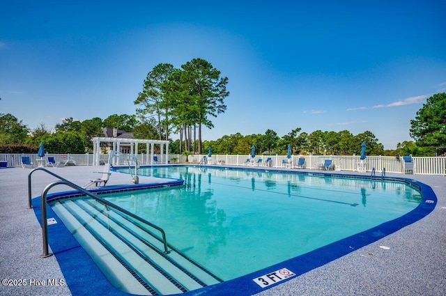 view of swimming pool featuring a patio