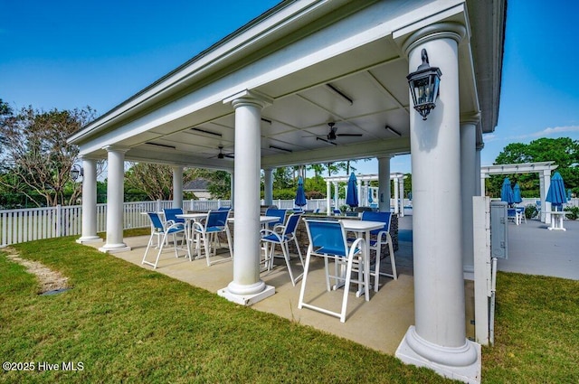 view of patio featuring ceiling fan