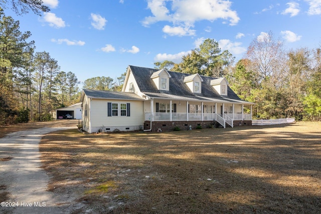 view of front of house with covered porch and a garage