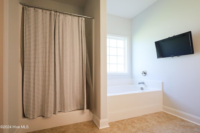 bathroom featuring shower / tub combo