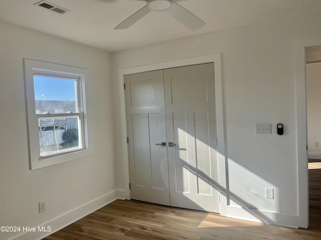 entryway with ceiling fan and hardwood / wood-style floors