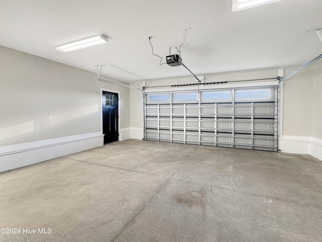 garage with a garage door opener