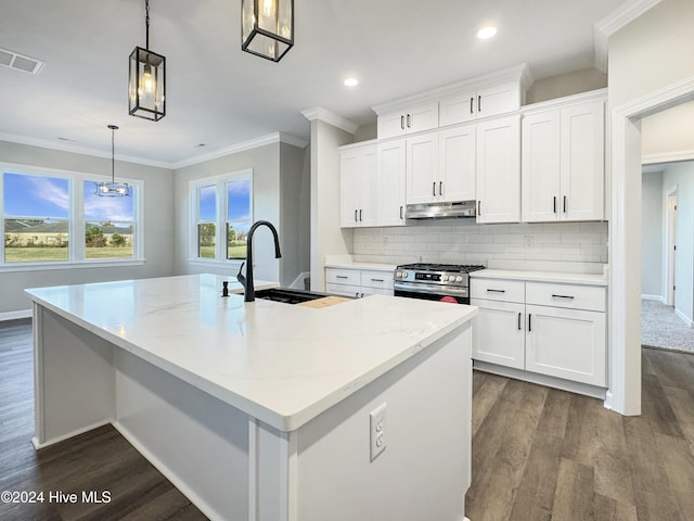 kitchen featuring a kitchen island with sink, pendant lighting, white cabinets, dark hardwood / wood-style floors, and stainless steel range with gas cooktop