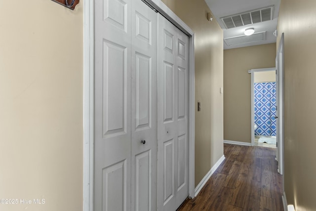 corridor featuring dark hardwood / wood-style flooring