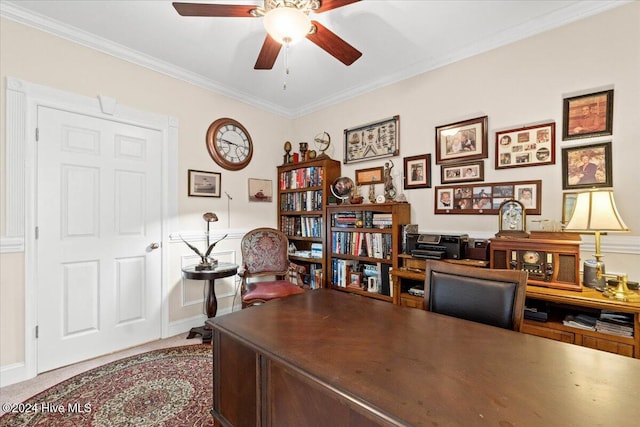 carpeted home office with crown molding and ceiling fan