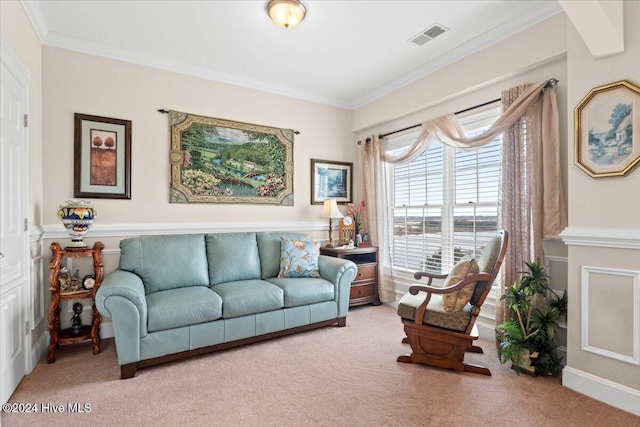 carpeted living room featuring crown molding