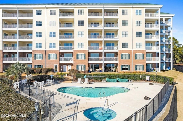 view of swimming pool with a patio area