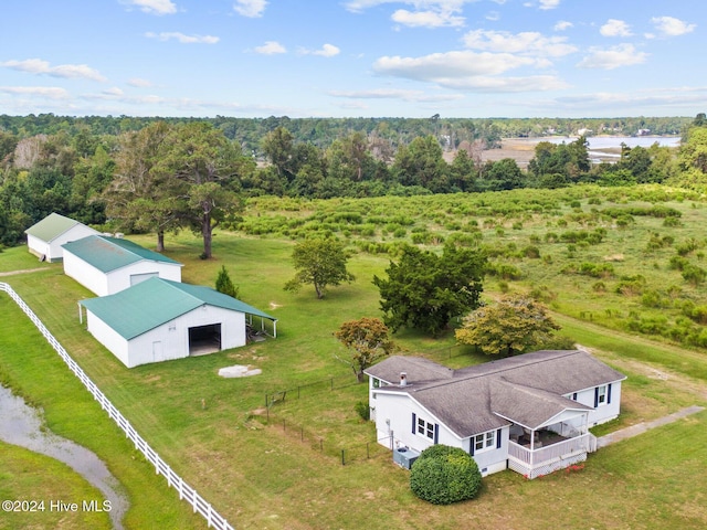 birds eye view of property featuring a rural view