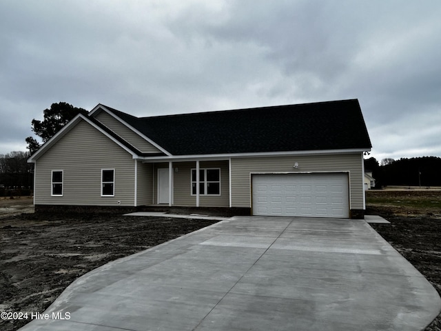 single story home featuring a garage