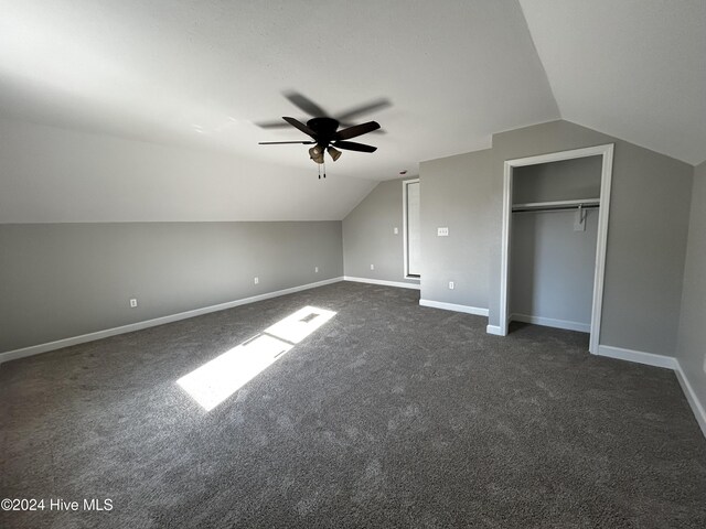 unfurnished living room with ceiling fan and dark hardwood / wood-style flooring