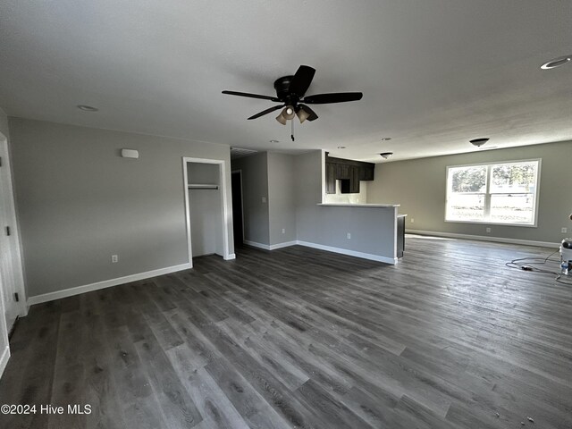 view of property exterior with a yard and central AC unit