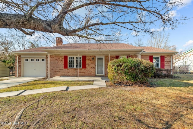 single story home with a front lawn and a garage