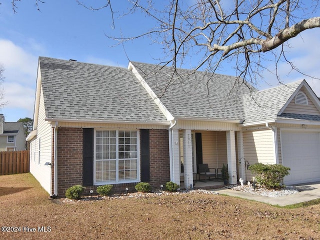 view of front of property with a garage