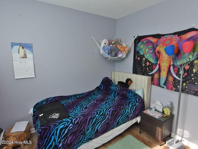 bedroom featuring a textured ceiling