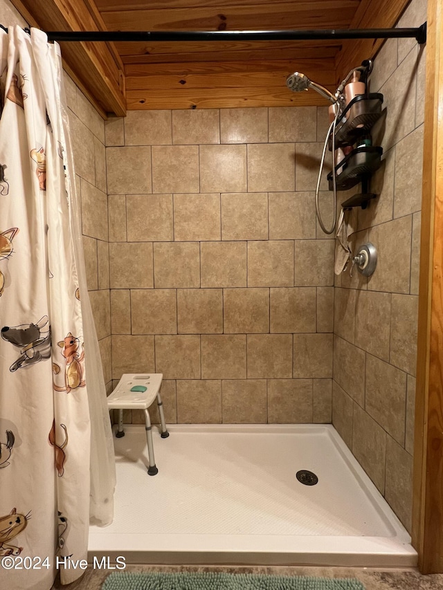 bathroom with a shower with curtain