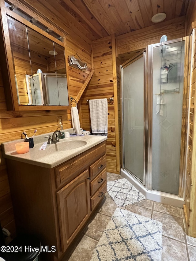 bathroom with vanity, an enclosed shower, wooden walls, and wood ceiling