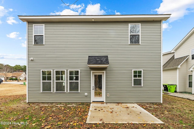 back of house with a patio area